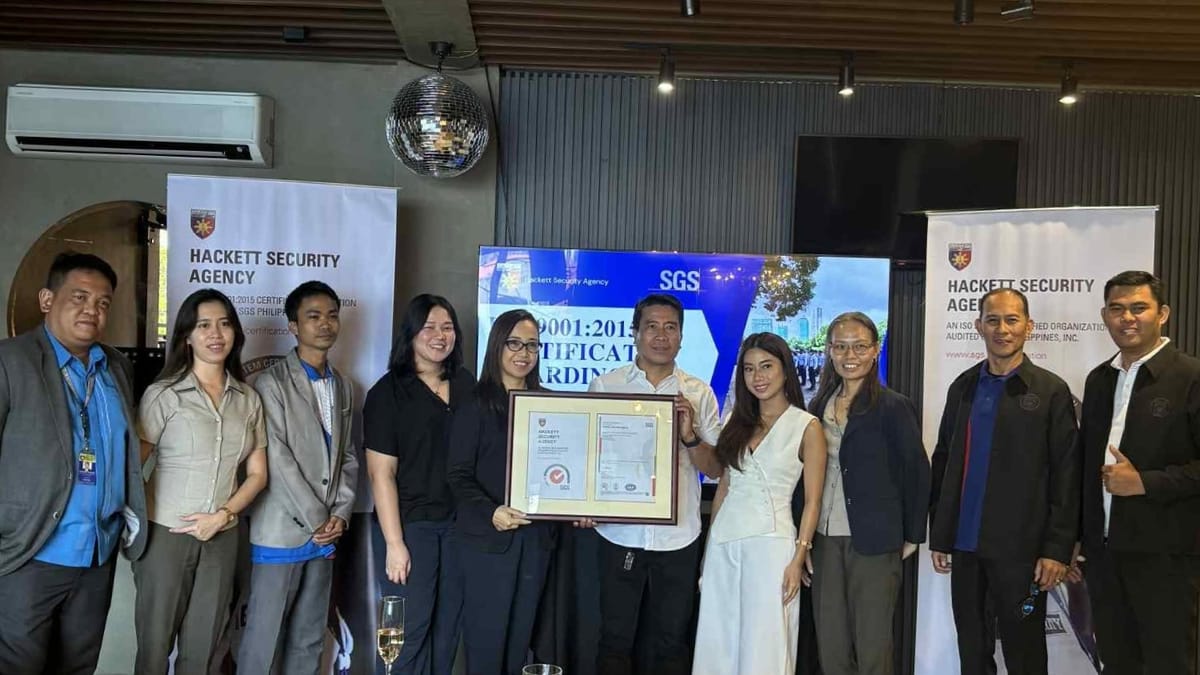 Hackett Security Agency receiving its ISO 9001:2015 certificate from SGS Philippines